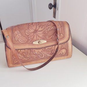 Tooled leather Purse which judging from the style was made in Mexico